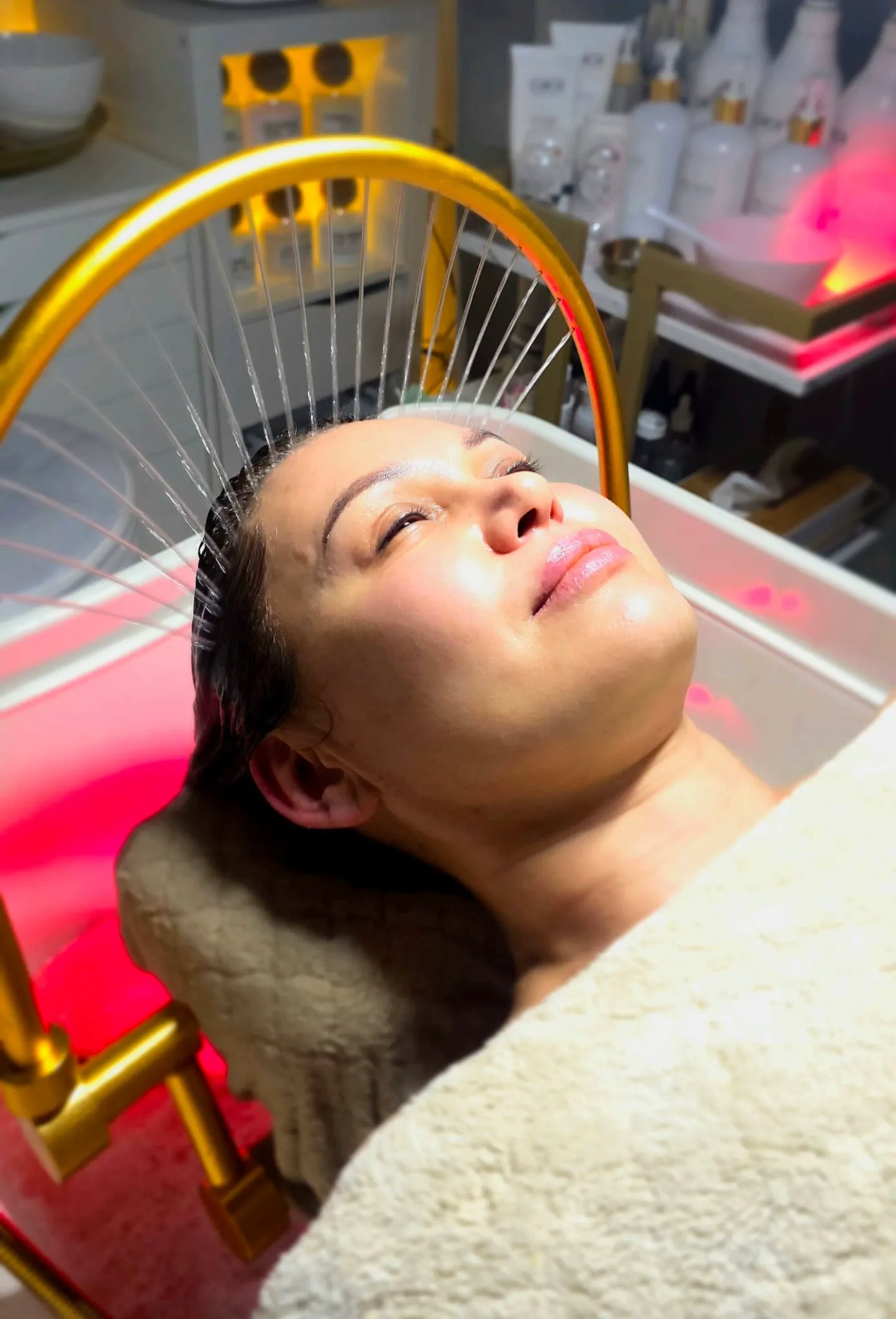 Apparative Kopfhaut-Massage